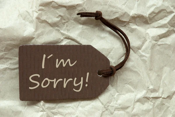 Brown Label With I Am Sorry Paper Background — Stock Photo, Image