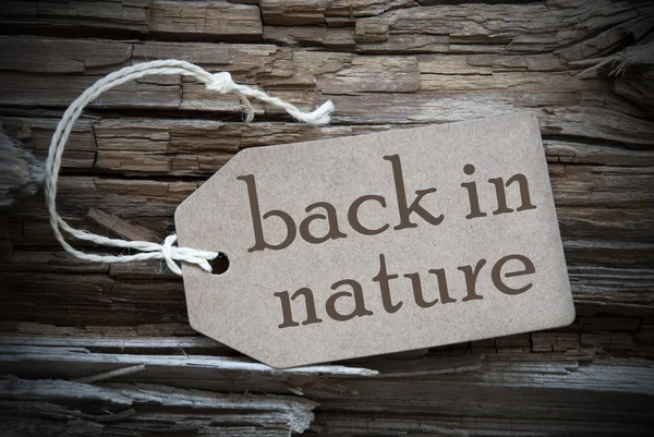 Voltar à natureza na etiqueta bege — Fotografia de Stock