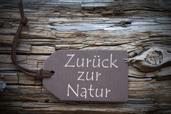 Zurueck zur natur bedeutet zurück zur Natur auf braunem Etikett — Stockfoto