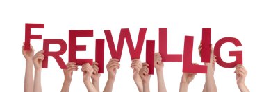 İnsanlar Holding kırmızı Word Freiwillig anlamına gelir gönüllü