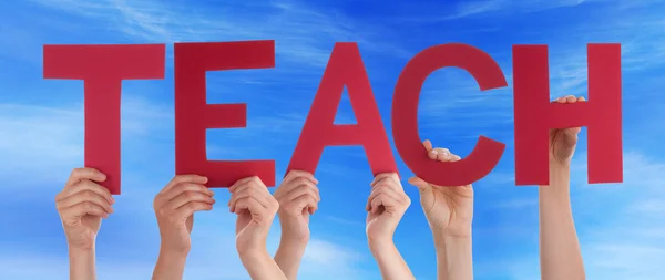 Hands Holding Red Straight Word Teach Blue Sky — Stock Photo, Image