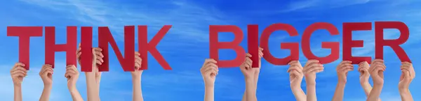 Hands Hold Red Straight Word Think Bigger Blue Sky — Stock Photo, Image