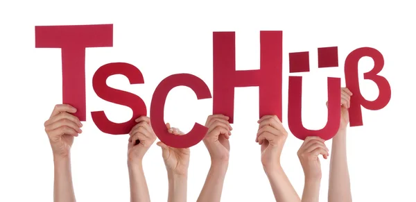 Människor höll i tyska ordet Tschuess betyder Bye — Stockfoto