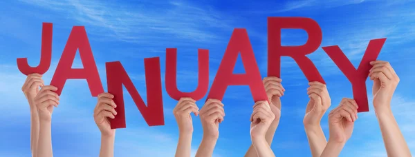 People Hands Holding Red Word January Blue Sky — Stock Photo, Image