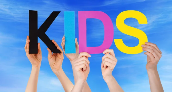 Hands Holding Colorful Straight Word Kids Blue Sky — Stock Photo, Image