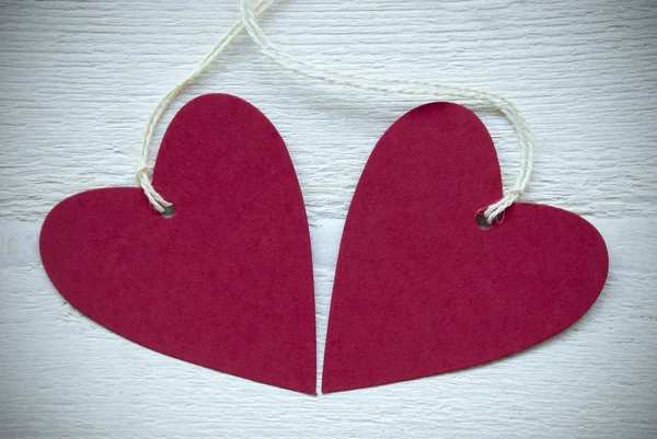 Dos corazones rojos con marco de espacio de copia —  Fotos de Stock