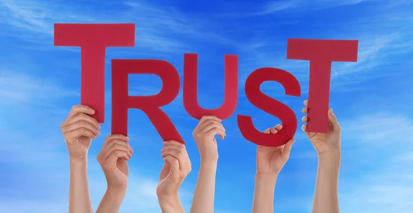 Many People Hands Holding Red Word Trust Blue Sky — Stock Photo, Image