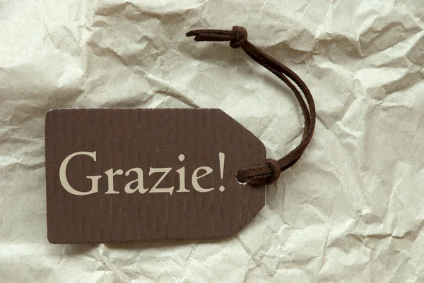 Etiqueta marrón con italiano Grazie significa gracias —  Fotos de Stock