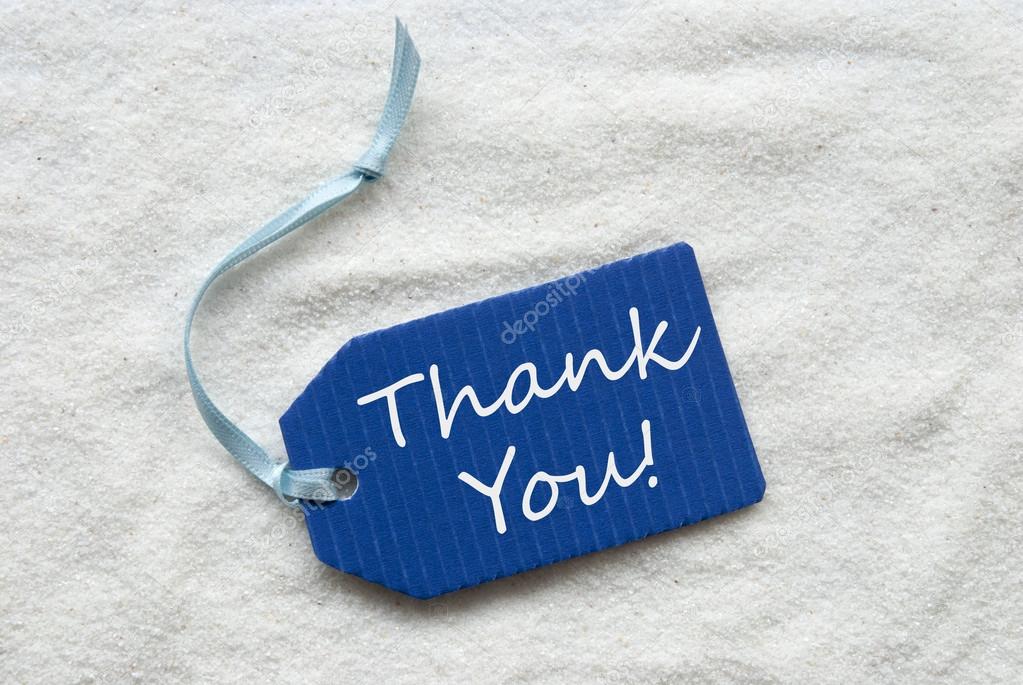 Thank You On Blue Label Sand Background