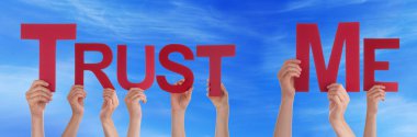 People Hands Holding Red Straight Word Trust Me Blue Sky