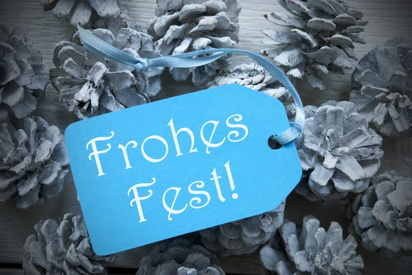 Light Blue Label On Fir Cones Frohes Fest Means Merry Christmas — 스톡 사진