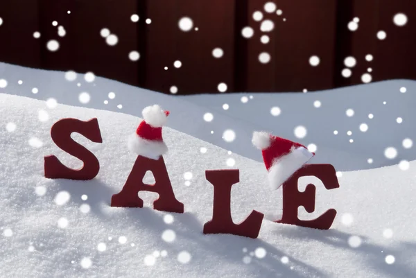 Christmas Sale On Snow Santa Hat And Snowflakes — Stok fotoğraf