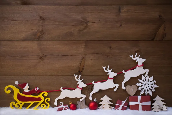 Red Santa Claus Sled With Reindeer, Snow, Christmas Decoration — Zdjęcie stockowe
