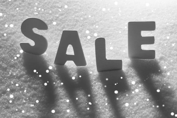 White Word Sale On Snow, Snowflakes — Stockfoto