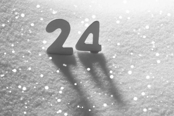 Weiße Zahl 24 auf Schnee, Schneeflocken — Stockfoto