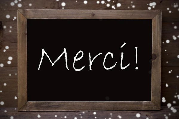 Chalkboard With Merci Means Thank You, Snowflakes — Stock Fotó