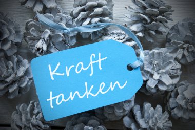 Blue Label On Fir Cones Kraft Tanke Means Building Strength clipart