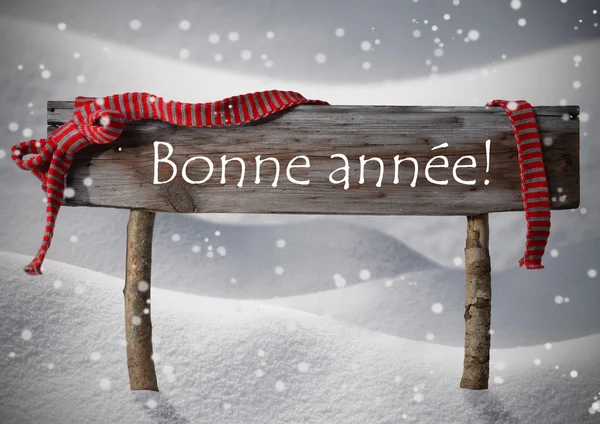 Boże Narodzenie znak Bonne année oznacza nowy rok, płatki śniegu, śnieg — Zdjęcie stockowe