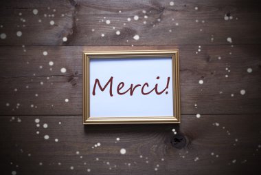 Merci demektir teşekkür ederim ve kar taneleri ile altın resim çerçevesi