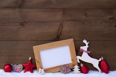 Red Christmas Card With Decoration On Snow, Copy Space