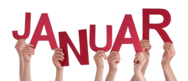 People Holding German Word Januar Means January
