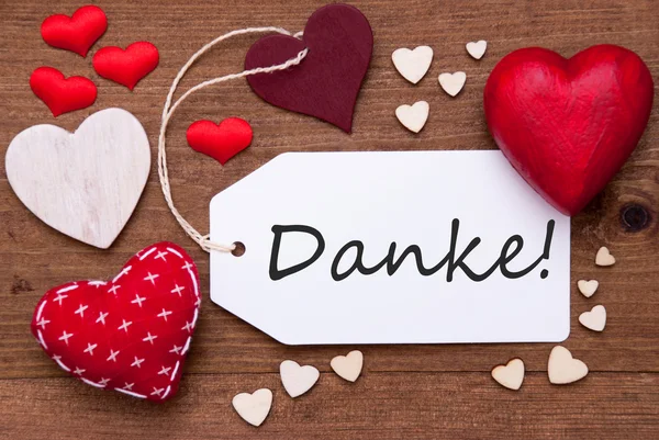 Etiqueta con corazones rojos, Danke Significado Gracias — Foto de Stock