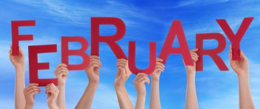 Many People Hands Holding Red Word February Blue Sky