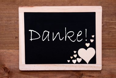 Blackboard With Wooden Hearts, Text Danke Means Thank You