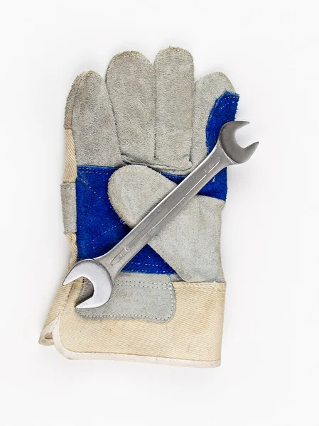 Gloves and wrench — Stock Photo, Image