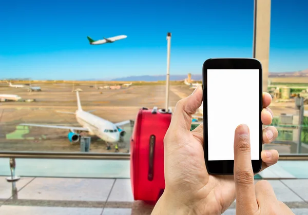 Touching the screen on the airport — Stok fotoğraf