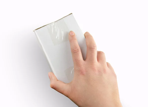 Hand catching the white box — Stock Photo, Image