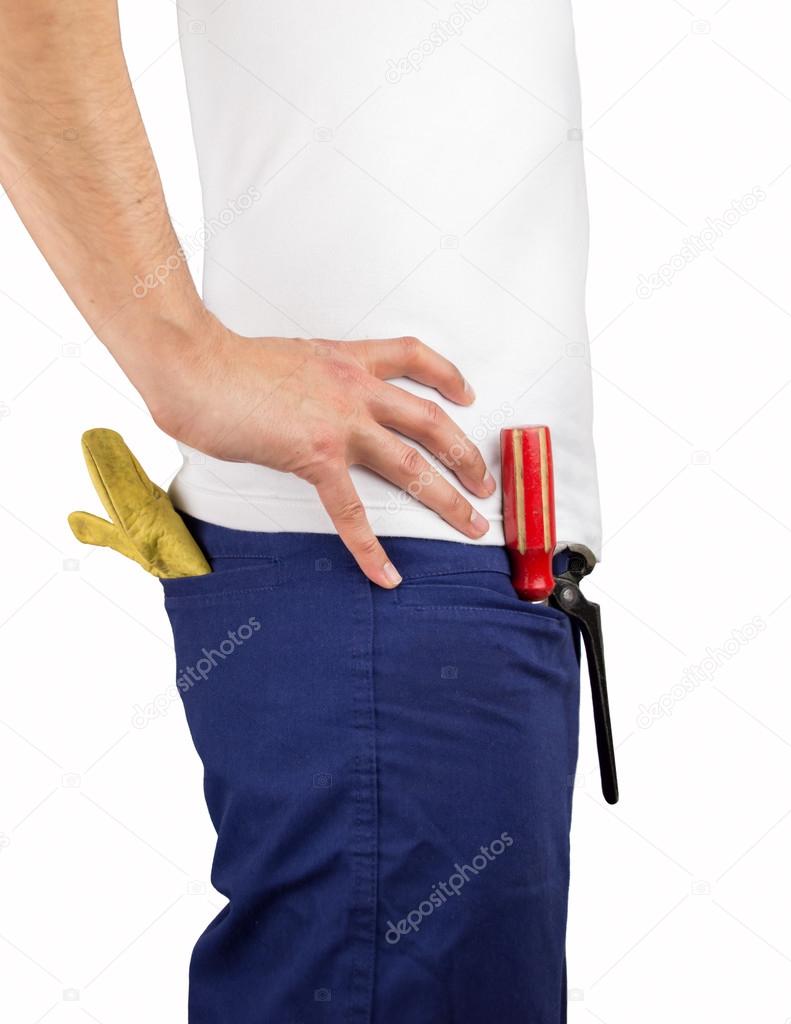 building worker with tools in pockets