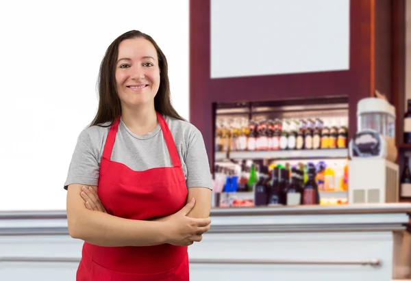 assistant with apron at the cafe