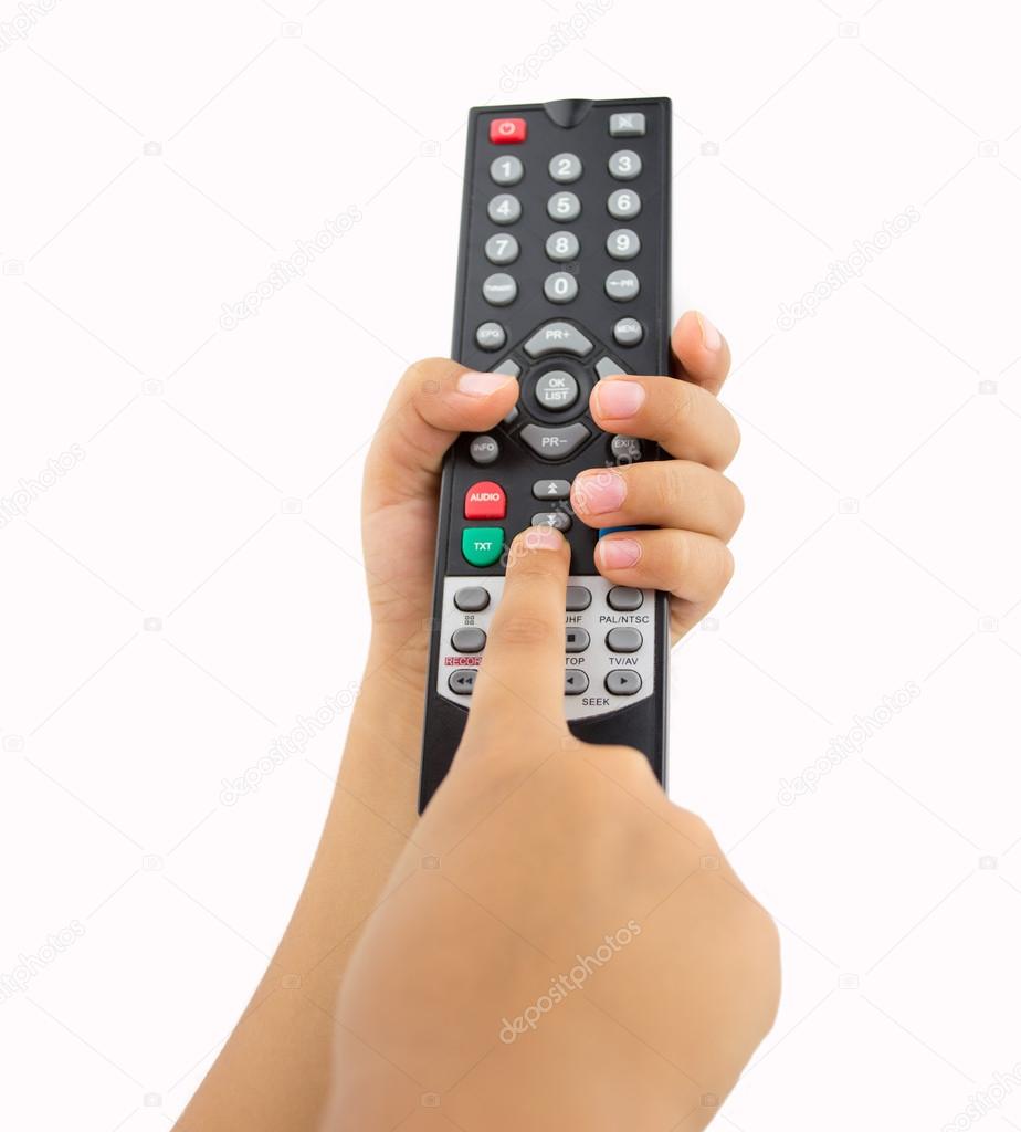 kid pressing the remote control