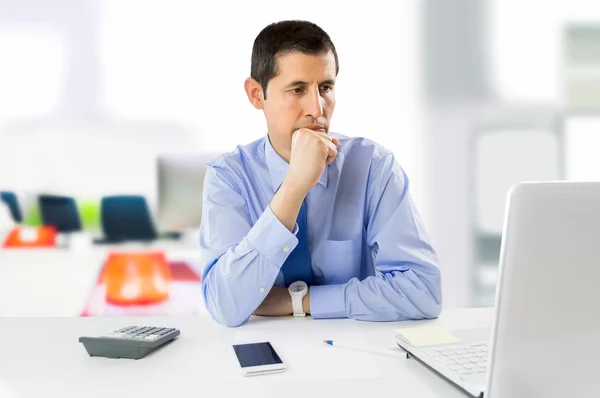 Businessman pensive at the office — Stock Photo, Image