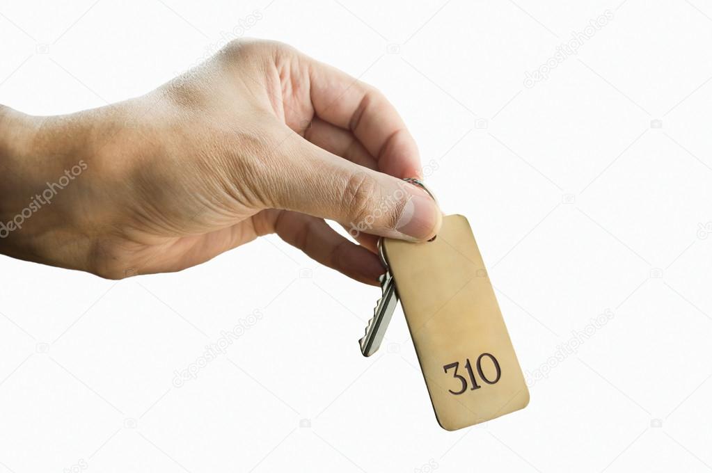 holding the hotel room key