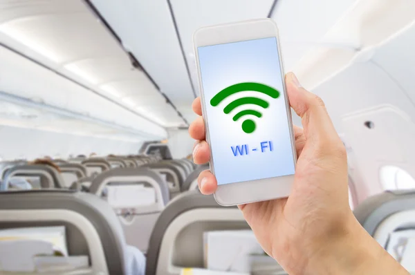 Met behulp van de wifi op mijn vlucht — Stockfoto