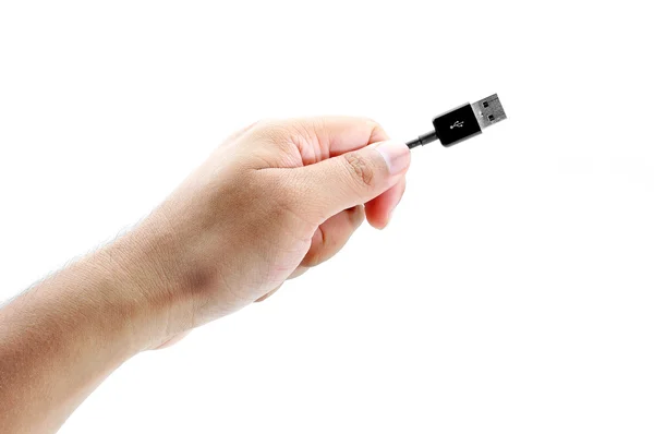 Hand holding USB cable — Stock Photo, Image