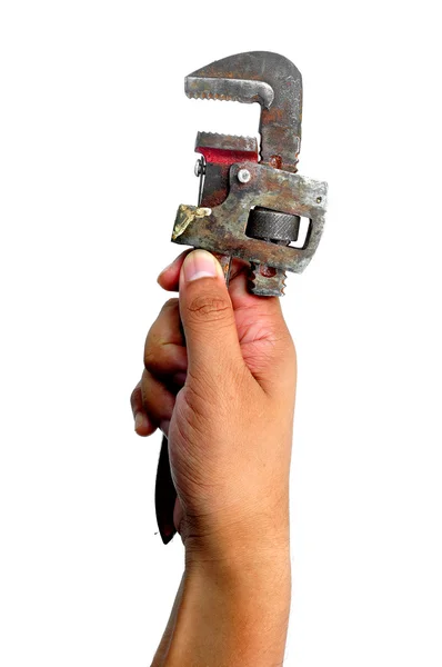 Рука тримає трубний гайковий ключ — стокове фото