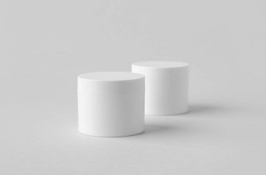 Tarafsız arkaplanda beyaz plastik kozmetik krem kutusu modeli