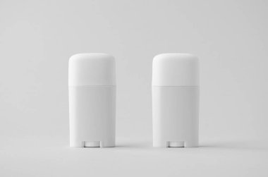 Tarafsız arkaplanda beyaz plastik deodorant ya da merhem modeli