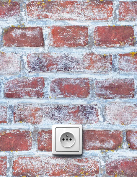 Oude bakstenen muur met socket — Stockfoto