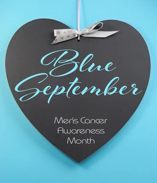 Blue September for mens health awareness month message greeting on heart shape blackboard — Stock Photo, Image