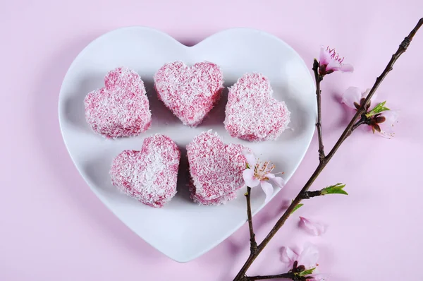 Pink heart shape small lamington cakes — Stock Photo, Image