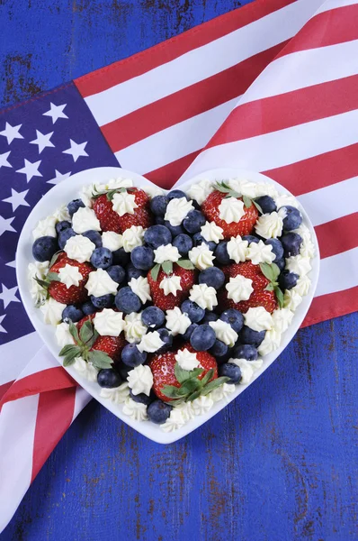 Red white and blue berries with fresh whipped cream stars. — Stock Photo, Image