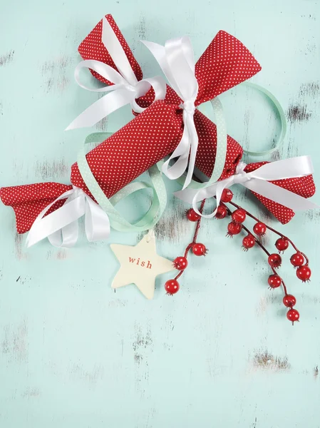 Modern Christmas red and white ornaments on aqua blue vintage wood background. — Stock Photo, Image