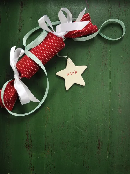 Christmas holiday ornaments on dark green wood background — Stock Photo, Image