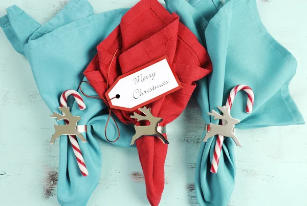 Merry Christmas table place setting red and aqua blue napkins — Stock Photo, Image