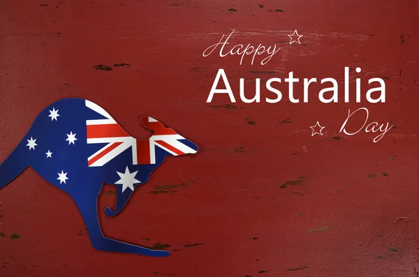 Australia Day röda trä bakgrund med känguru form flagga — Stockfoto