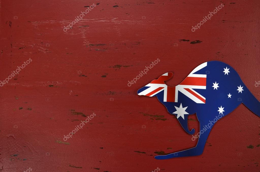 Australia Day red wood background with kangaroo shape Stock Photo by ©amarosy 61896367